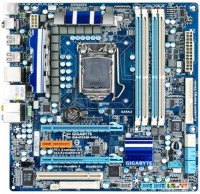 Photos - Motherboard Gigabyte GA-P55M-UD4 